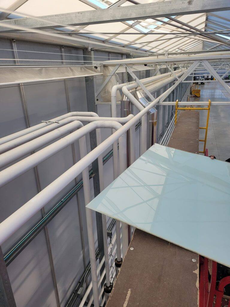 Greenhouse glass replacement by VGB Workers