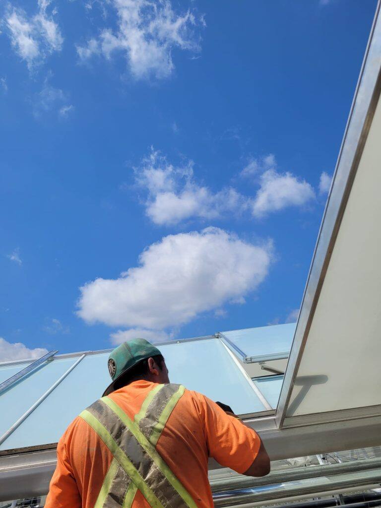 Greenhouse glass replacement by VGB Workers