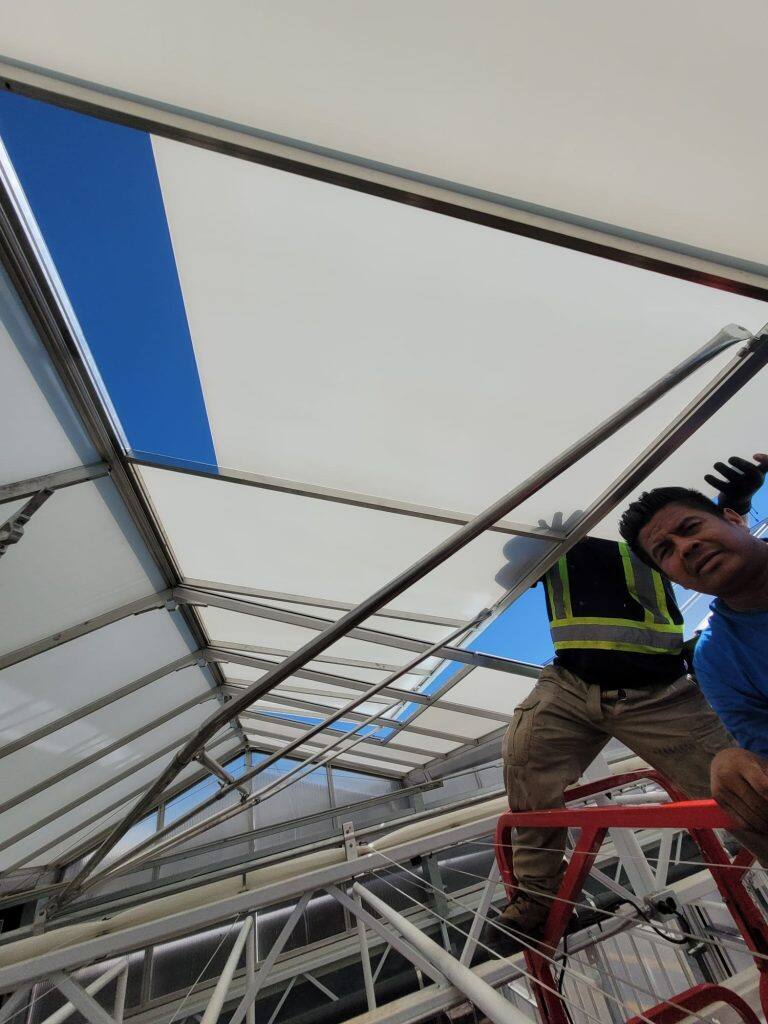 Greenhouse glass replacement by VGB Workers