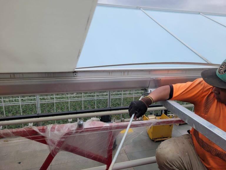 Greenhouse glass replacement by VGB Workers