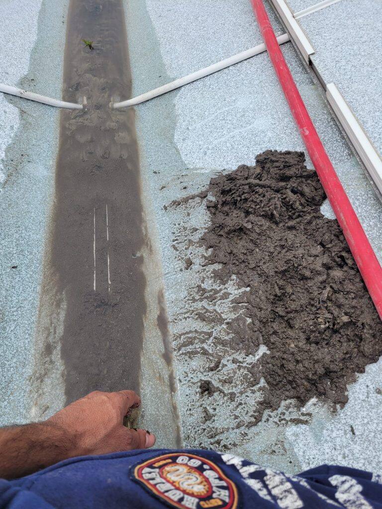 Greenhouse gutter cleaning and maintenance