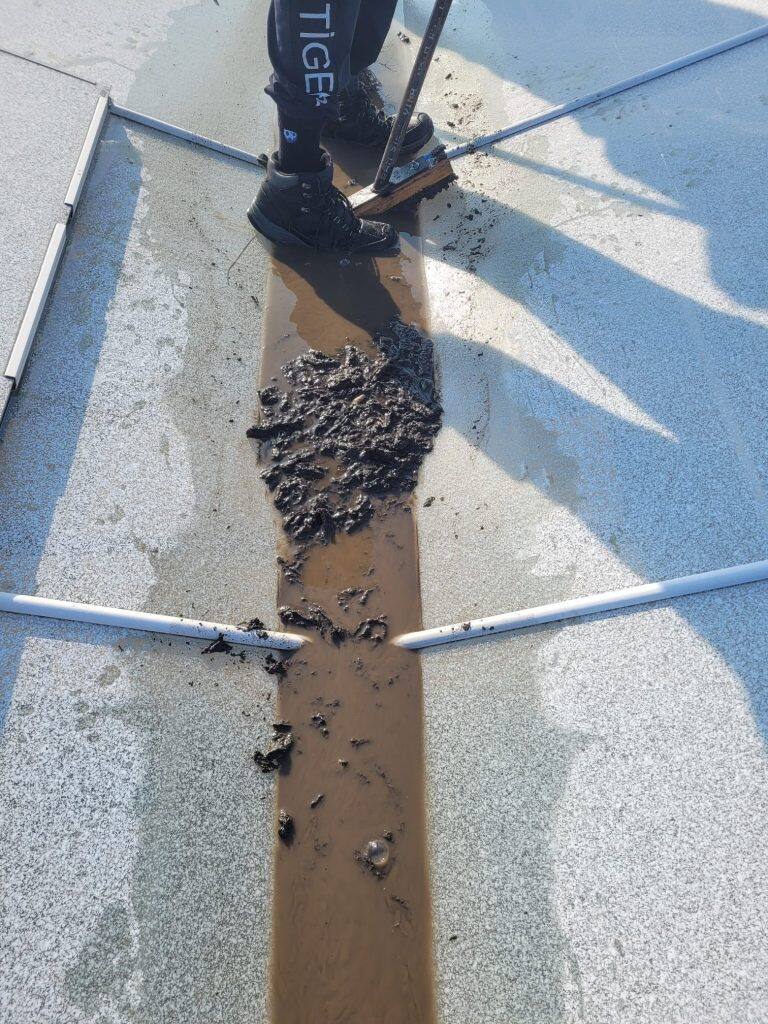 Greenhouse gutter cleaning and maintenance