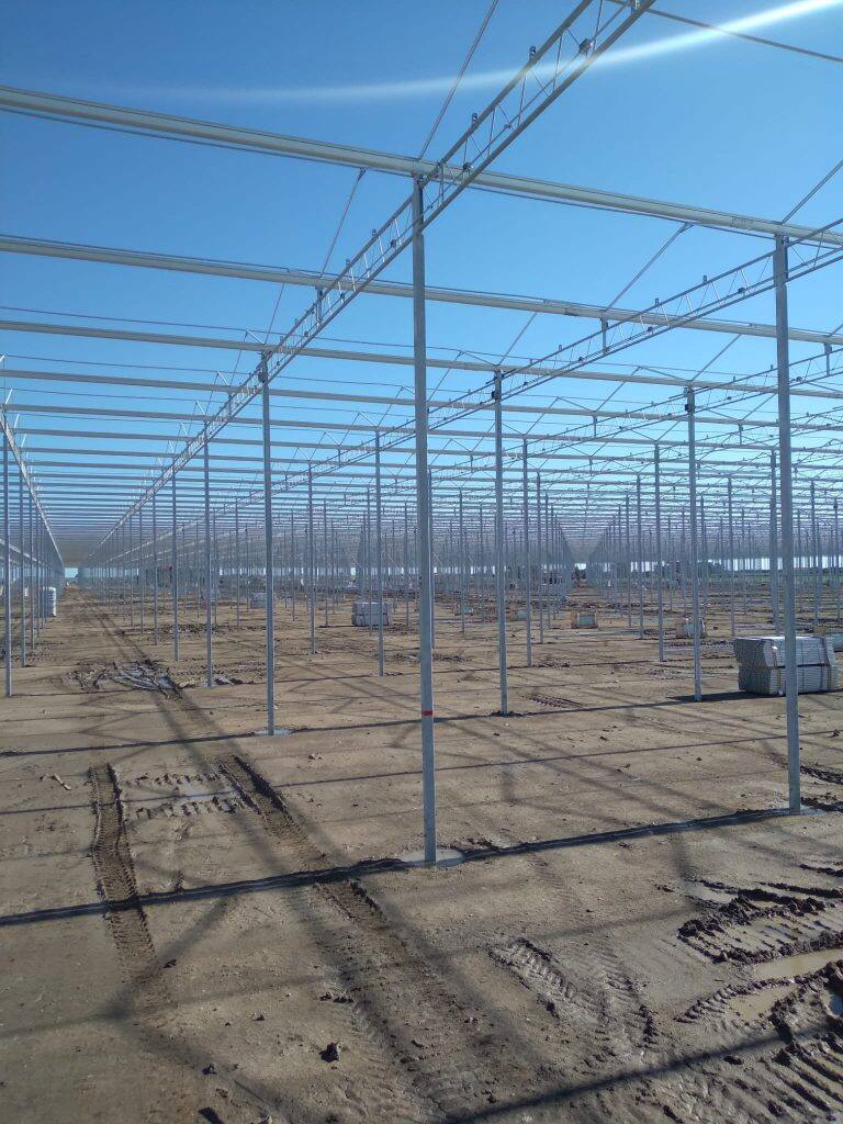 Greenhouse steel frame construction by VGB Workers