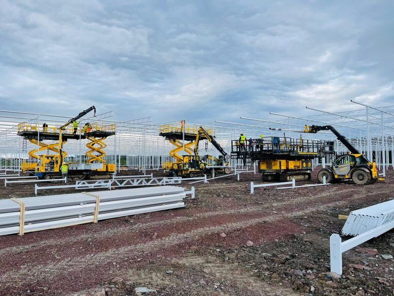 Specialized greenhouse construction machinery operated by VGB Workers
