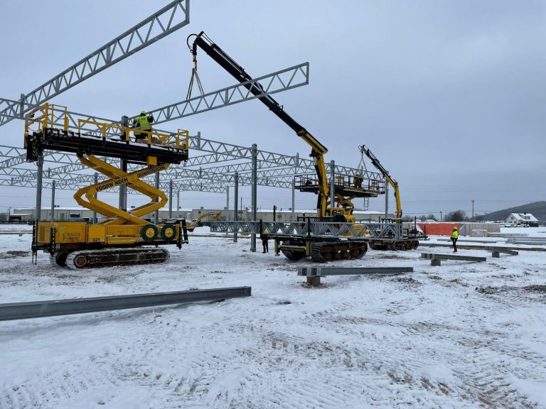 Specialized greenhouse construction machinery operated by VGB Workers