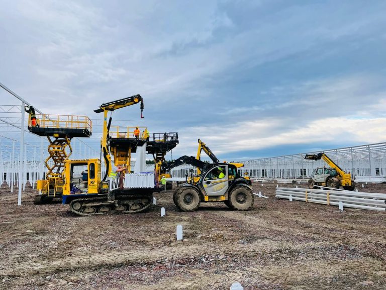 Specialized greenhouse construction machinery operated by VGB Workers