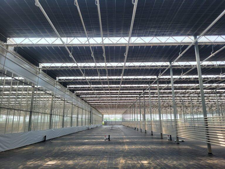Greenhouse screen system installation by VGB Workers