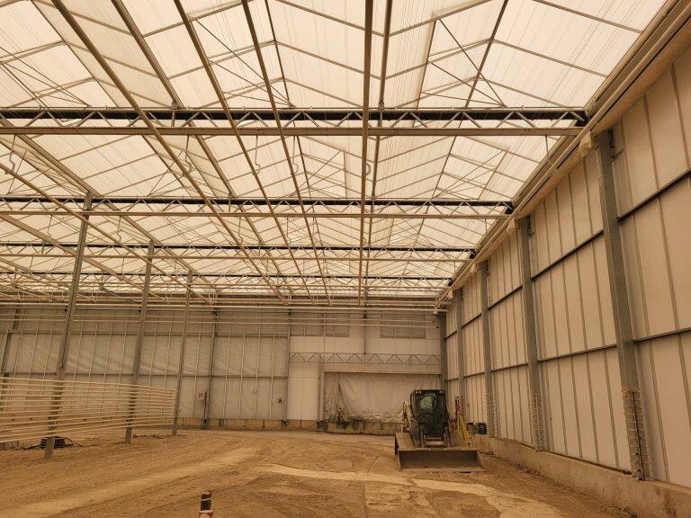 Greenhouse screen system installation by VGB Workers